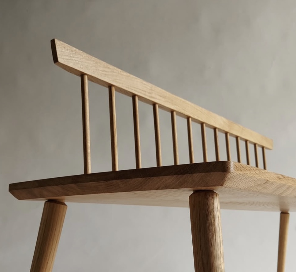 Detail of the back of the solid oak bench seat with chamfer detail.
